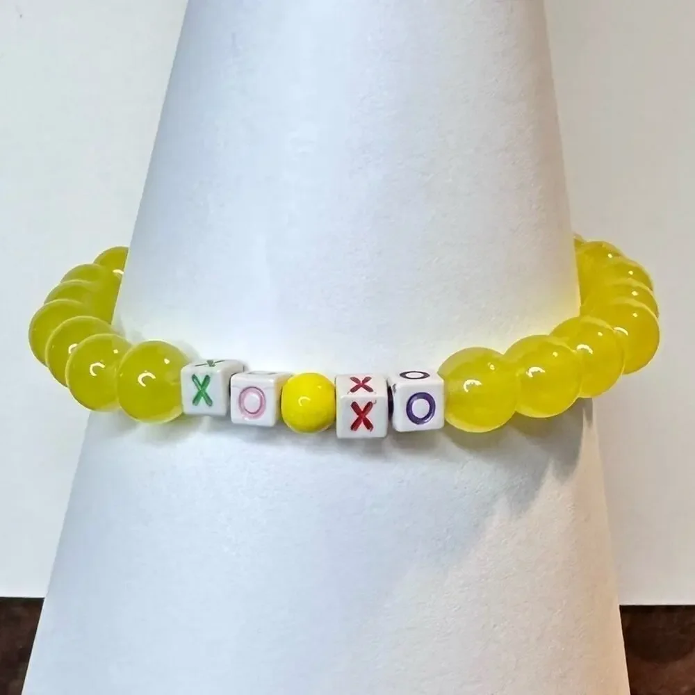 XO yellow handmade bracelet 8mm glass beads friendship